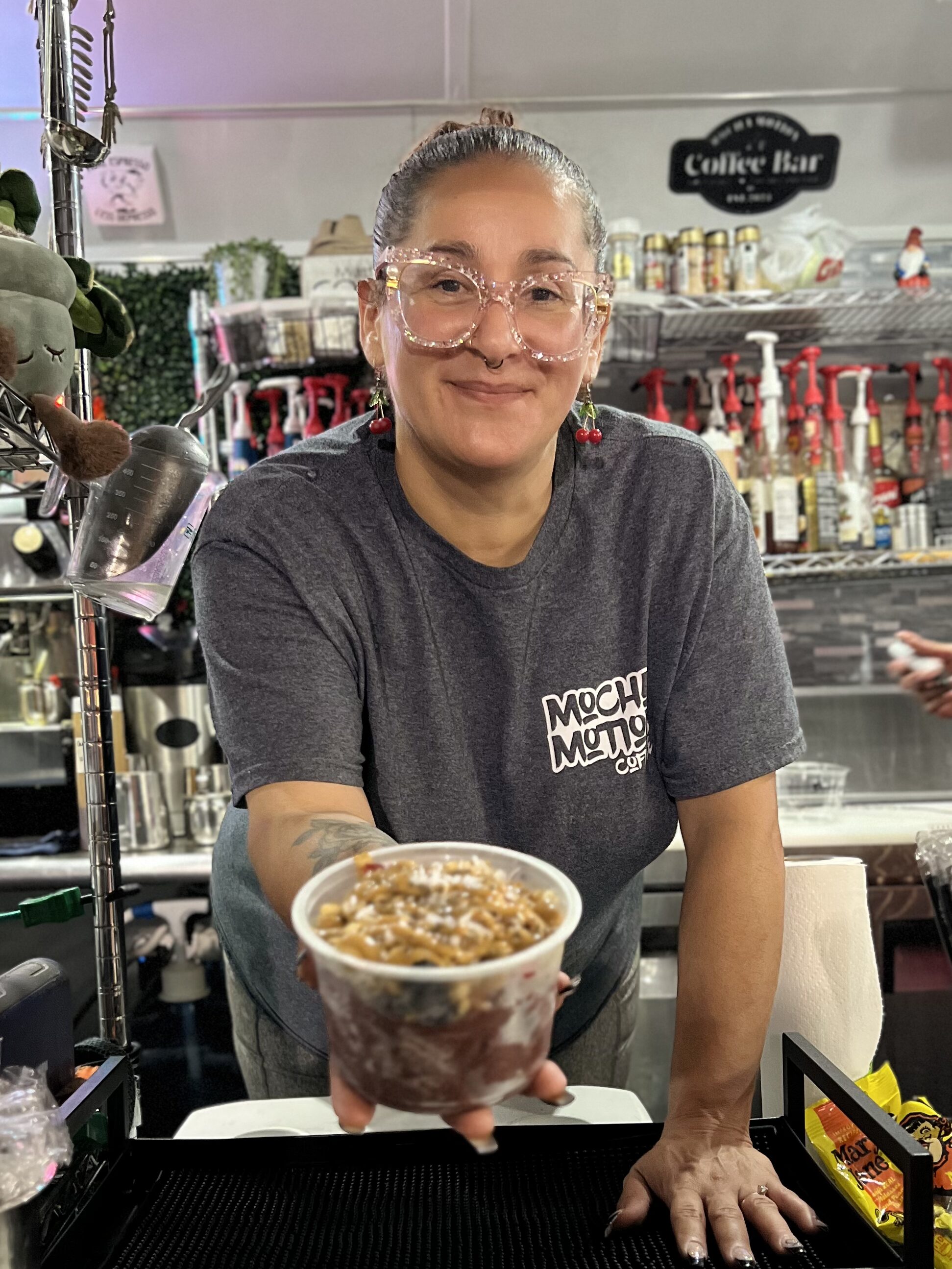 Jazzy from Mocha Motion serving an acai bowl from the window at the Etown Fair 2026