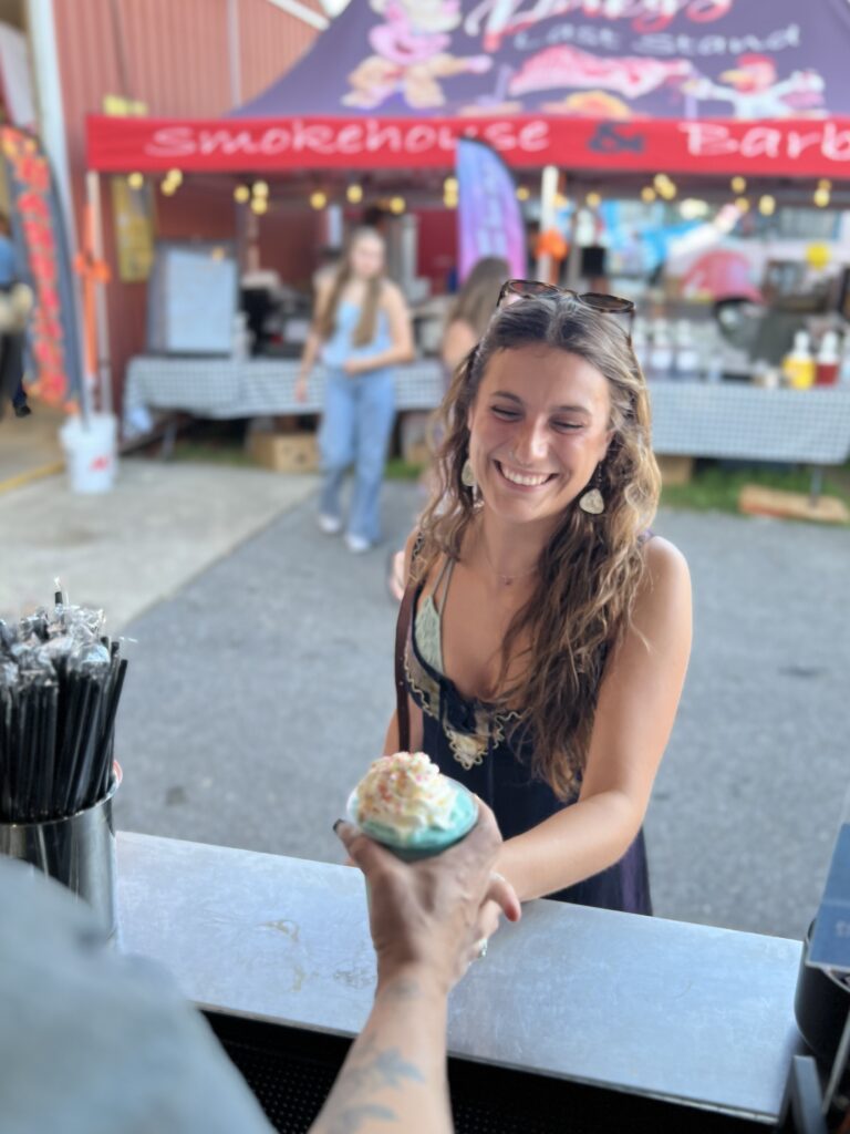 Guest picking up their coffee order from Mocha Motion Coffee at the Etown Fair.