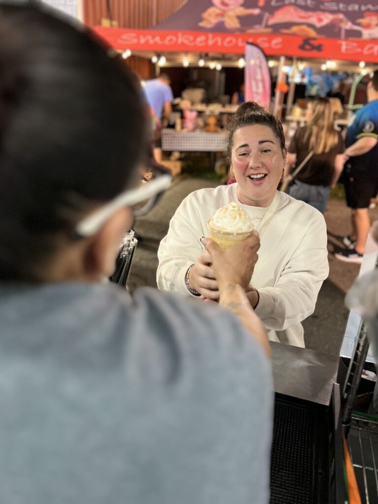 Guest receiving their drink from a Mocha Motion Coffee server at the Elizabethtown Fair.